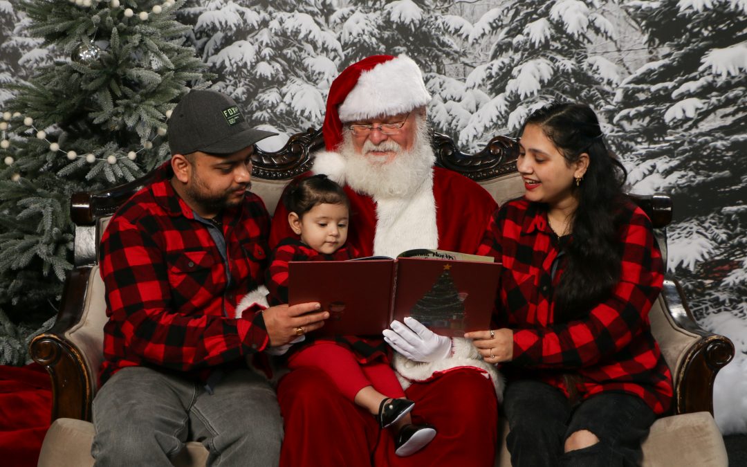 Santa with Family in matching holiday sweaters